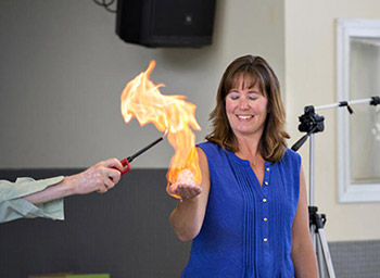 Woman looking at a flame